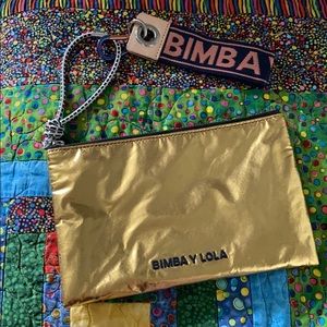 Bombay y Lola clutch wristlet